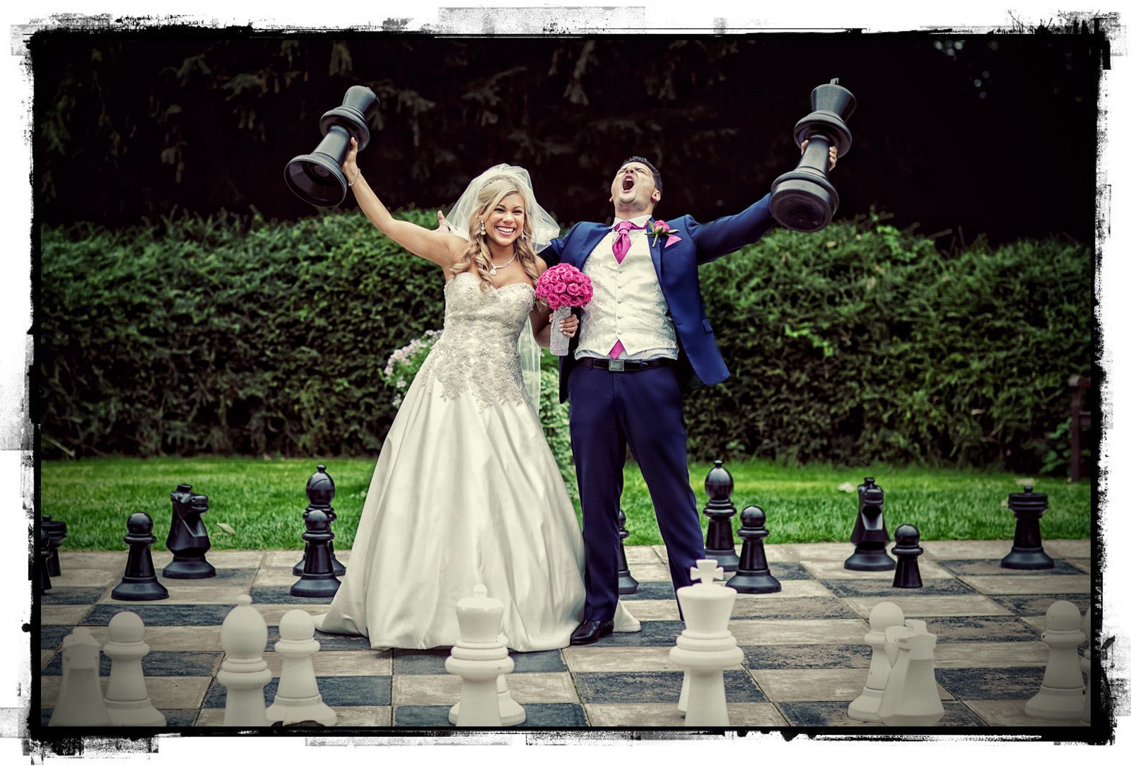 Wedding couple on chess board Down Hall Country House