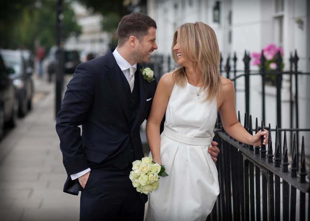 wedding couple laughing in Chelsea