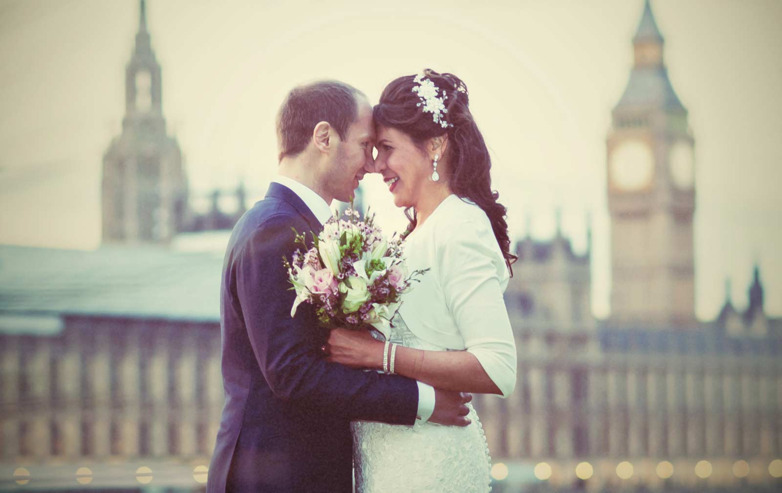 wedding couple by London houses of parliament shot