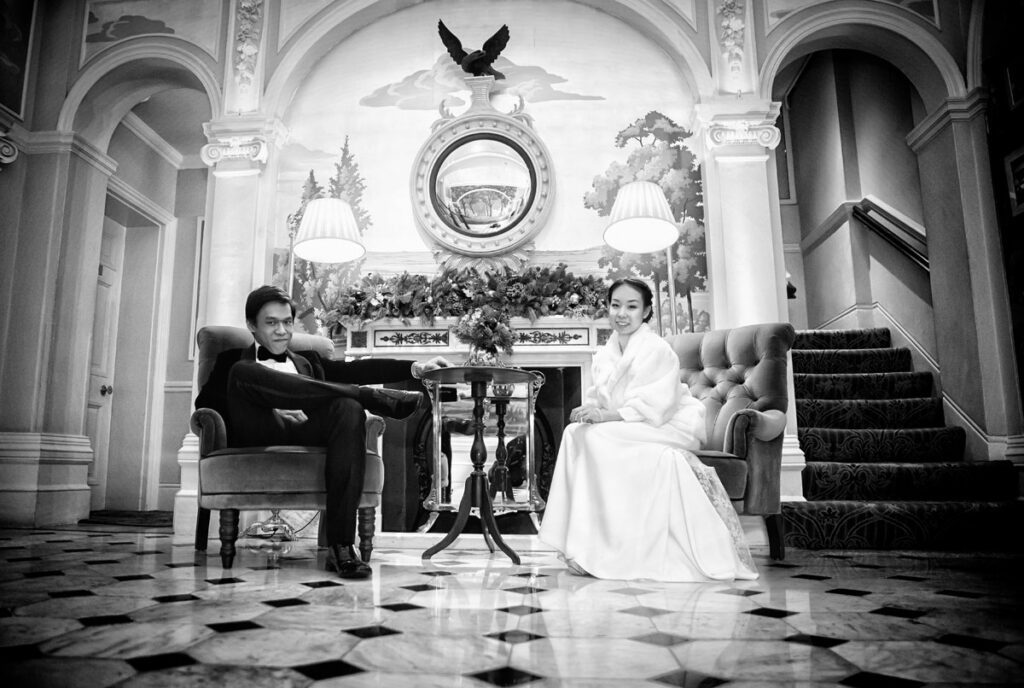 Wedding photo of couple in lobby of Goring Hotel London