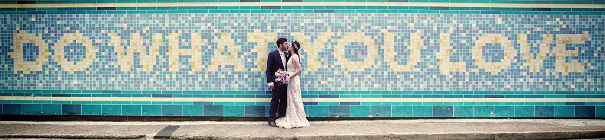 Wedidng couple kiss by London mosaic Islington Metal Works