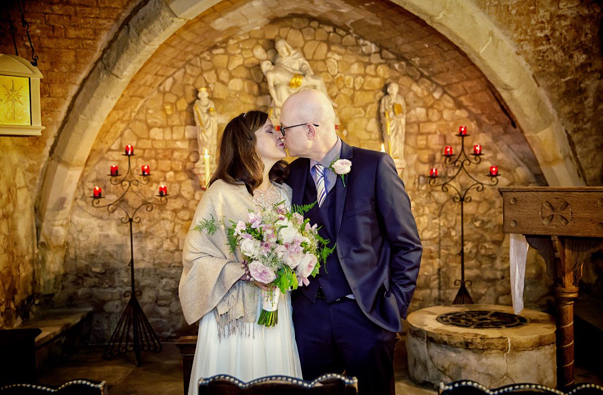 Wedding kiss at St Olave London crypt photo