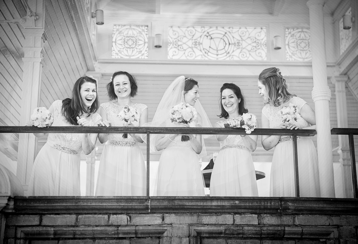 Bridesmaids laughing at Lords Cricket Ground wedding