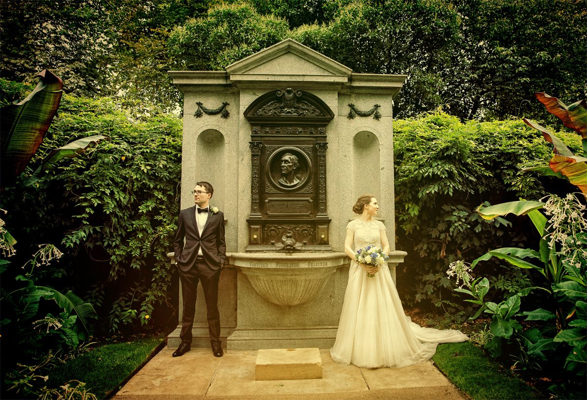 London wedding couple in gardens before Gherkin reception