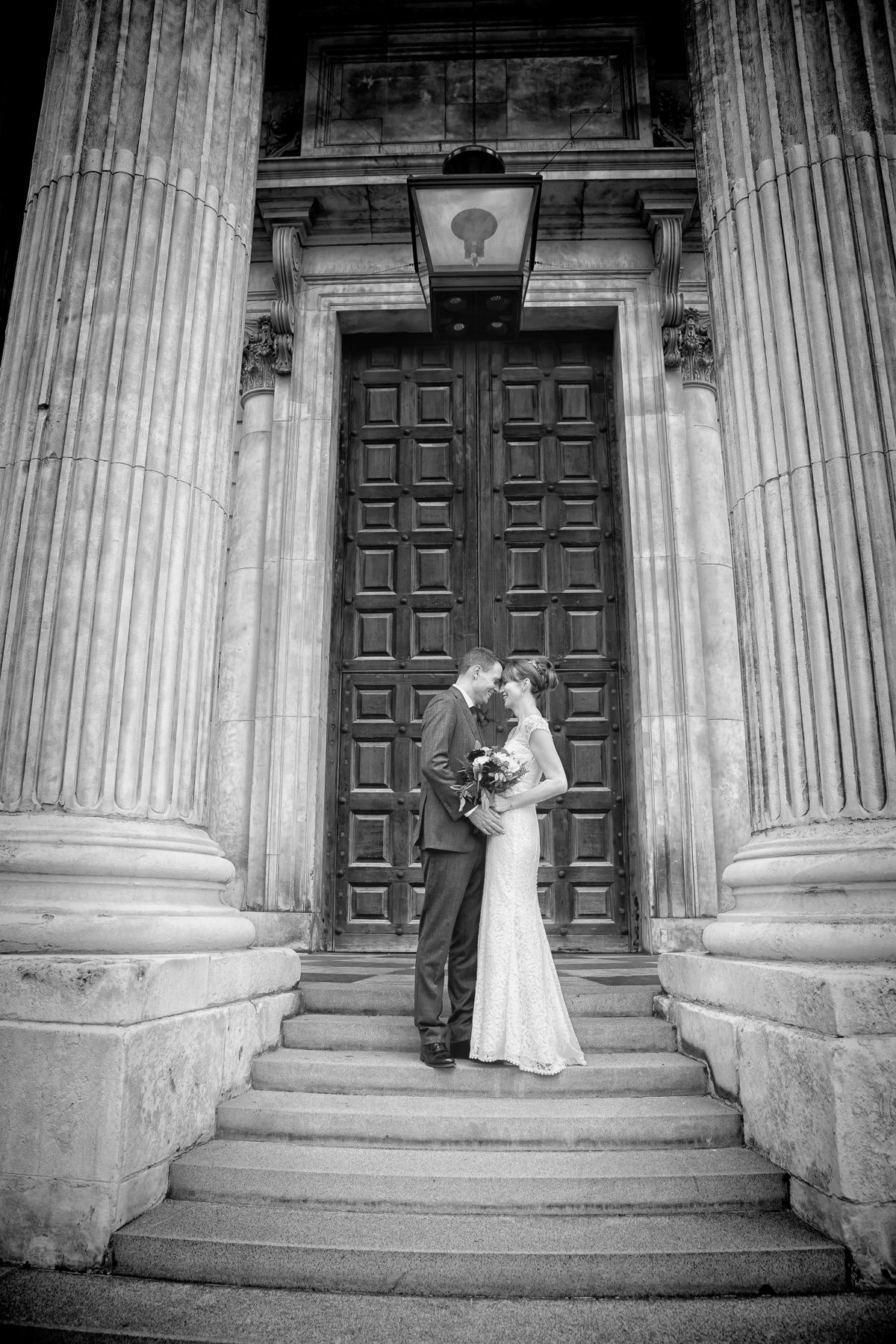Bride and groom on St Pauls Cathedral steps