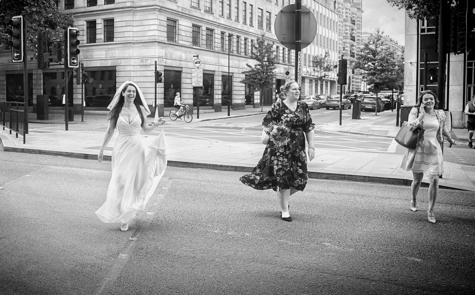 Bride crossing road to Old Marylebone Town Hall wedding
