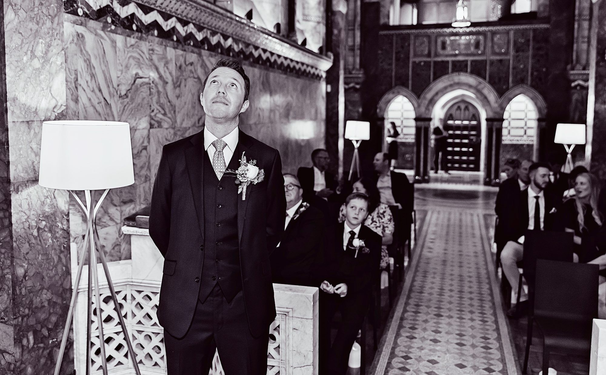 Groom waits for bride Fitzrovia Chapel wedding Westminster London