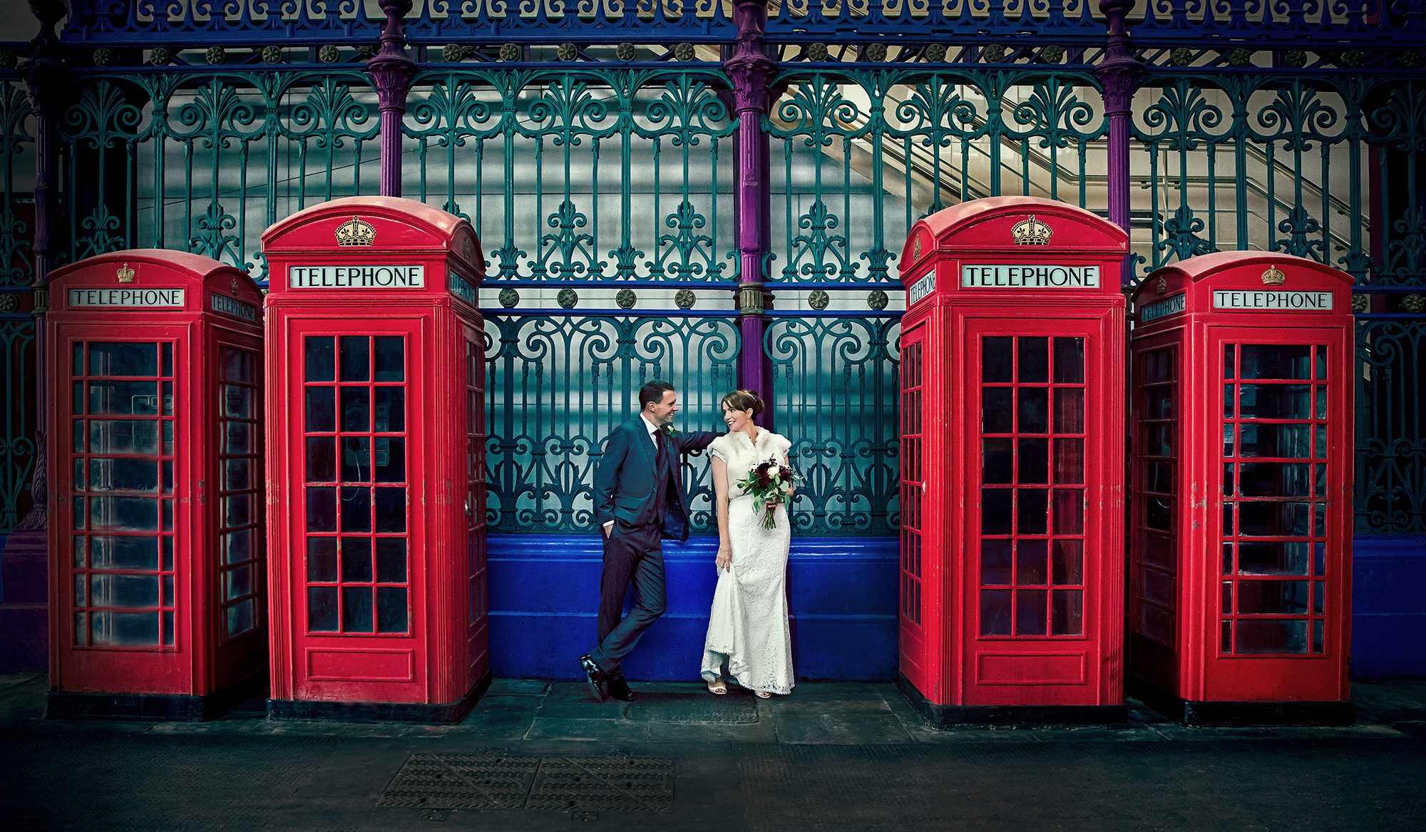 London wedding photographer phonebox and bride and groom banner 2023